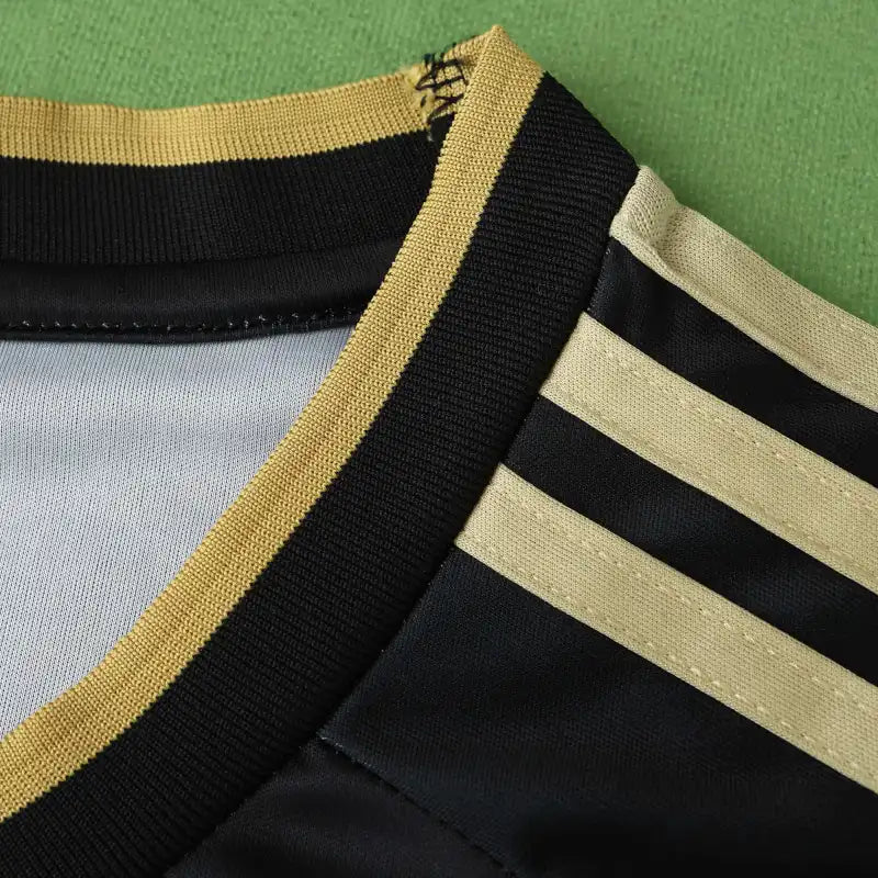 Real Madrid CF – Camiseta Concept Frenzy Negra y Dorada 24/25 Fan Version
