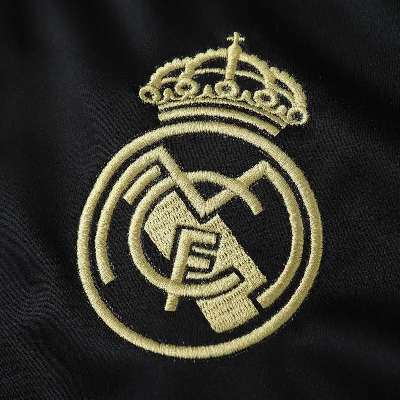 Real Madrid CF – Camiseta Concept Frenzy Negra y Dorada 24/25 Fan Version